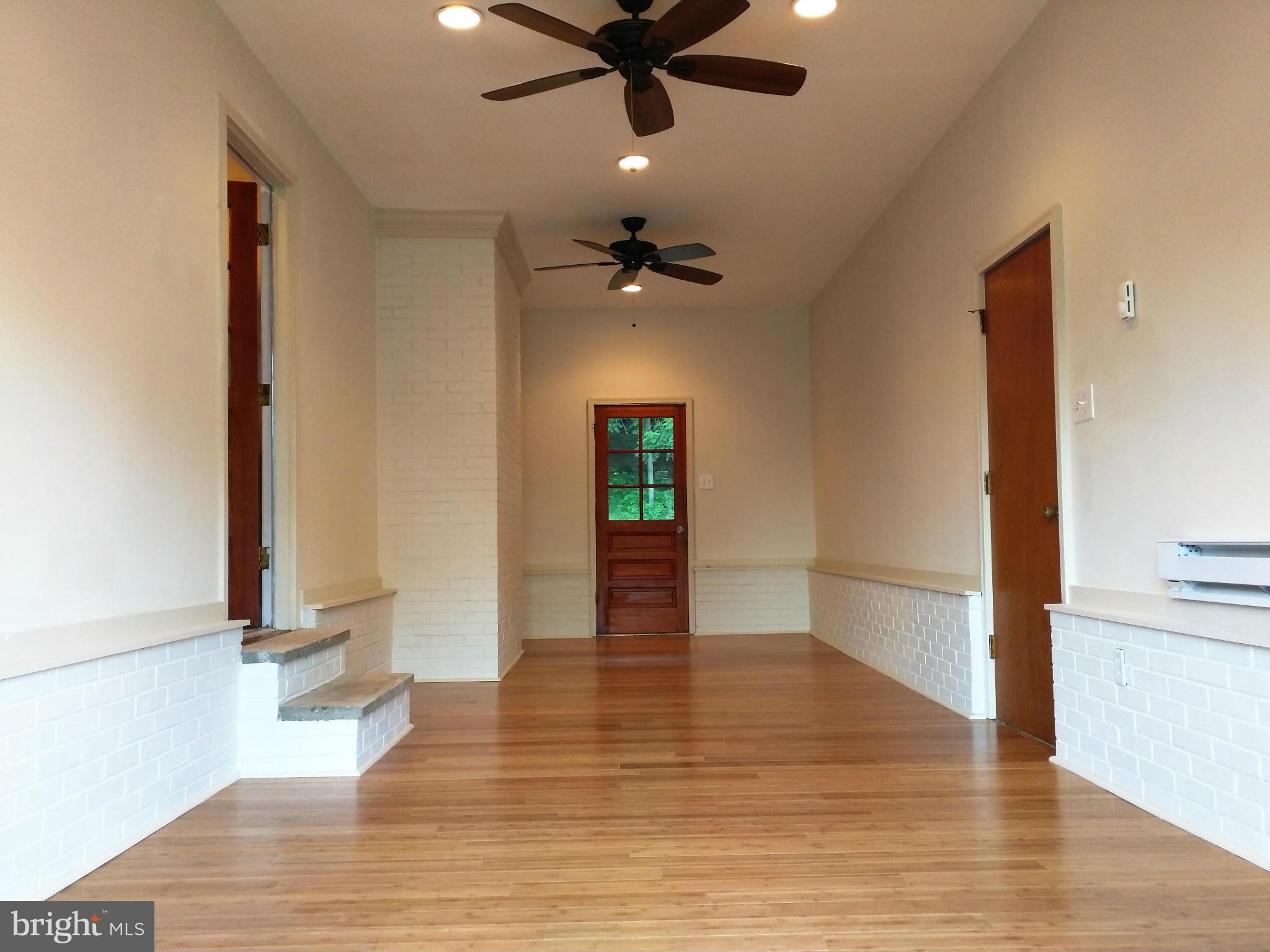 4231 Basford Road Frederick, MD 21703 - Photo 6 of 28 Great Room/Breezeway