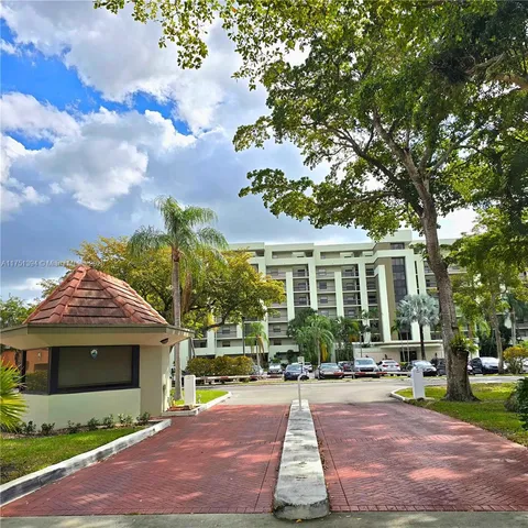 a view of a house with a garden