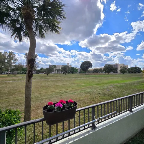 a view of a lake with a garden