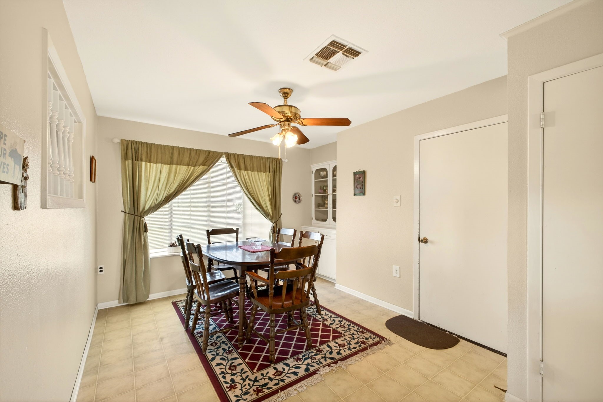 212 Halstedt Road La Grange, TX 78945 - Photo 12 of 40 a dining room with furniture a chandelier and wooden floor