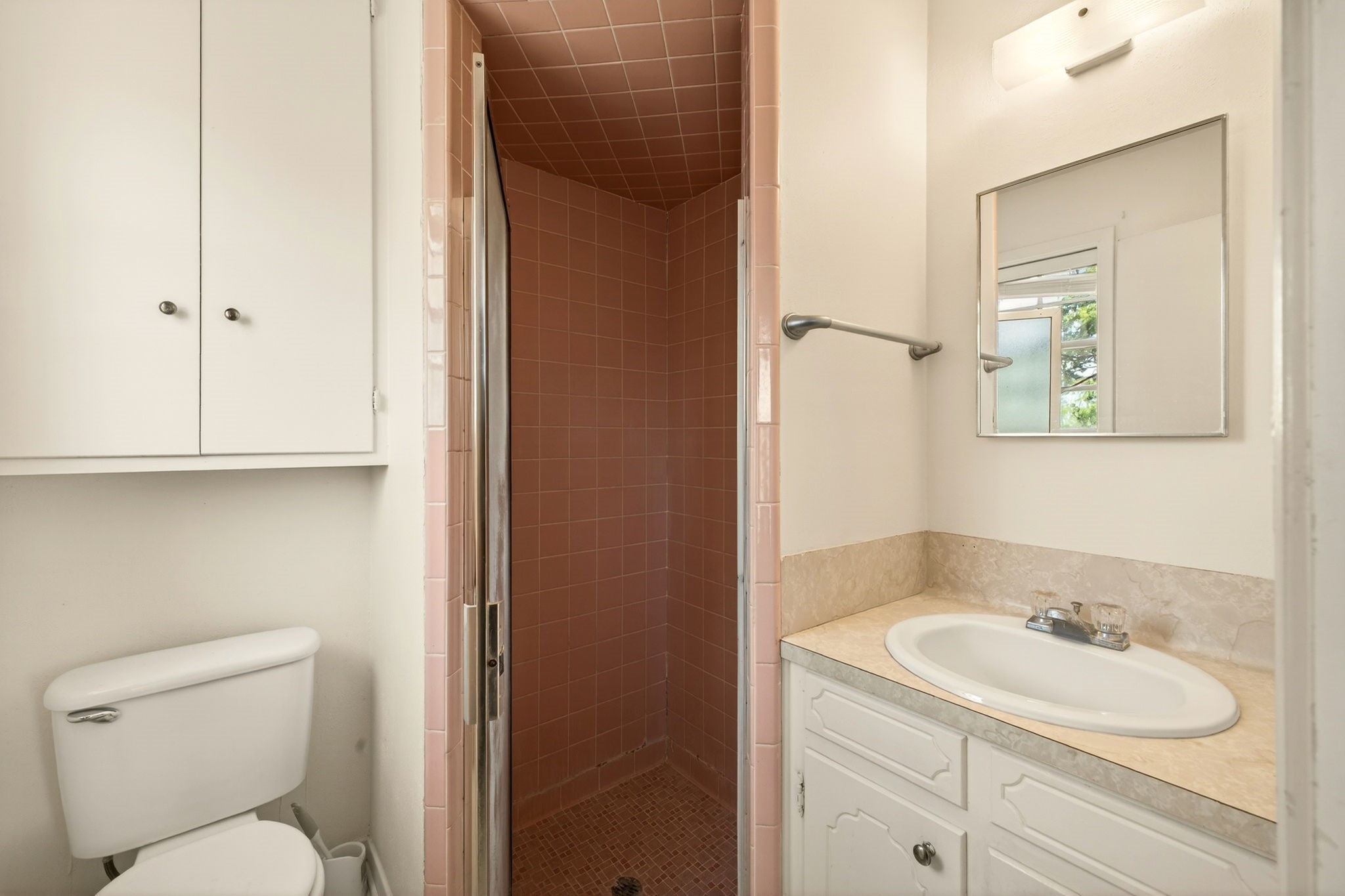 212 Halstedt Road La Grange, TX 78945 - Photo 15 of 40 a bathroom with a toilet sink vanity and mirror
