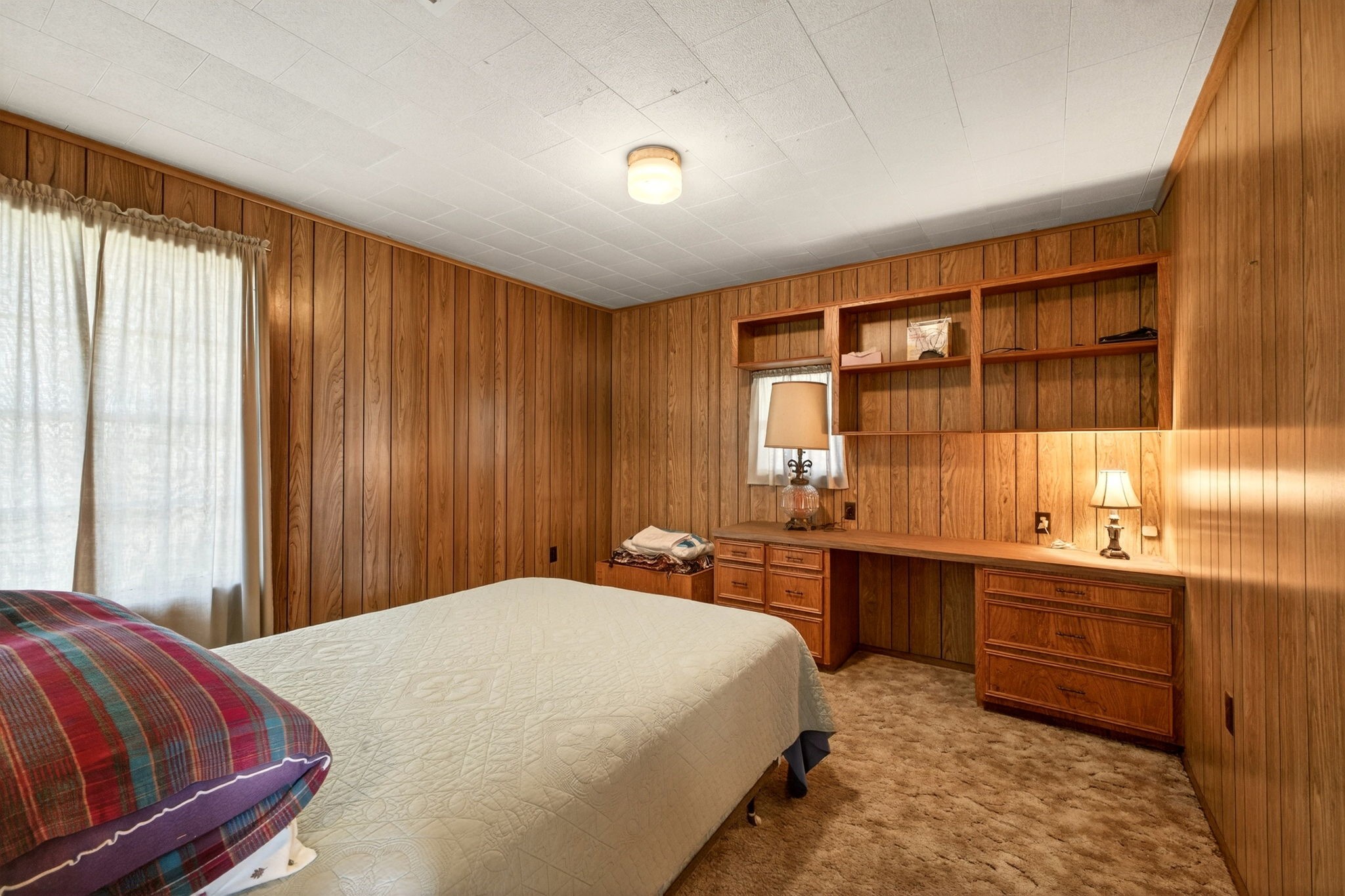212 Halstedt Road La Grange, TX 78945 - Photo 19 of 40 a bedroom with a large bed and a window