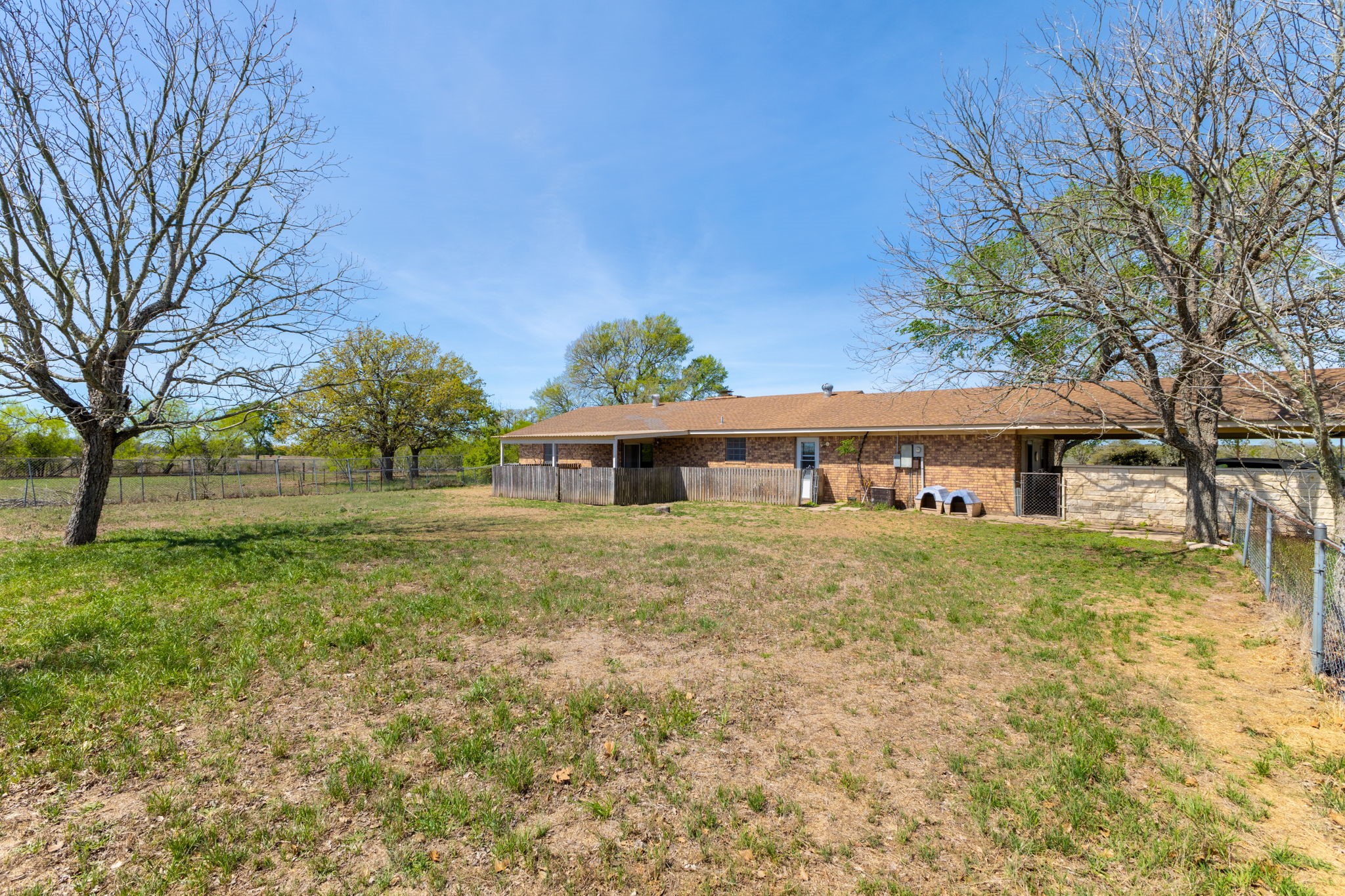 212 Halstedt Road La Grange, TX 78945 - Photo 25 of 40 a view of a big house with a big yard and large tree