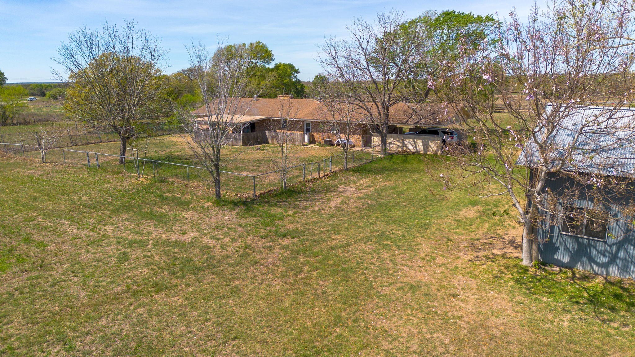 212 Halstedt Road La Grange, TX 78945 - Photo 36 of 40 a view of a swimming pool with a yard