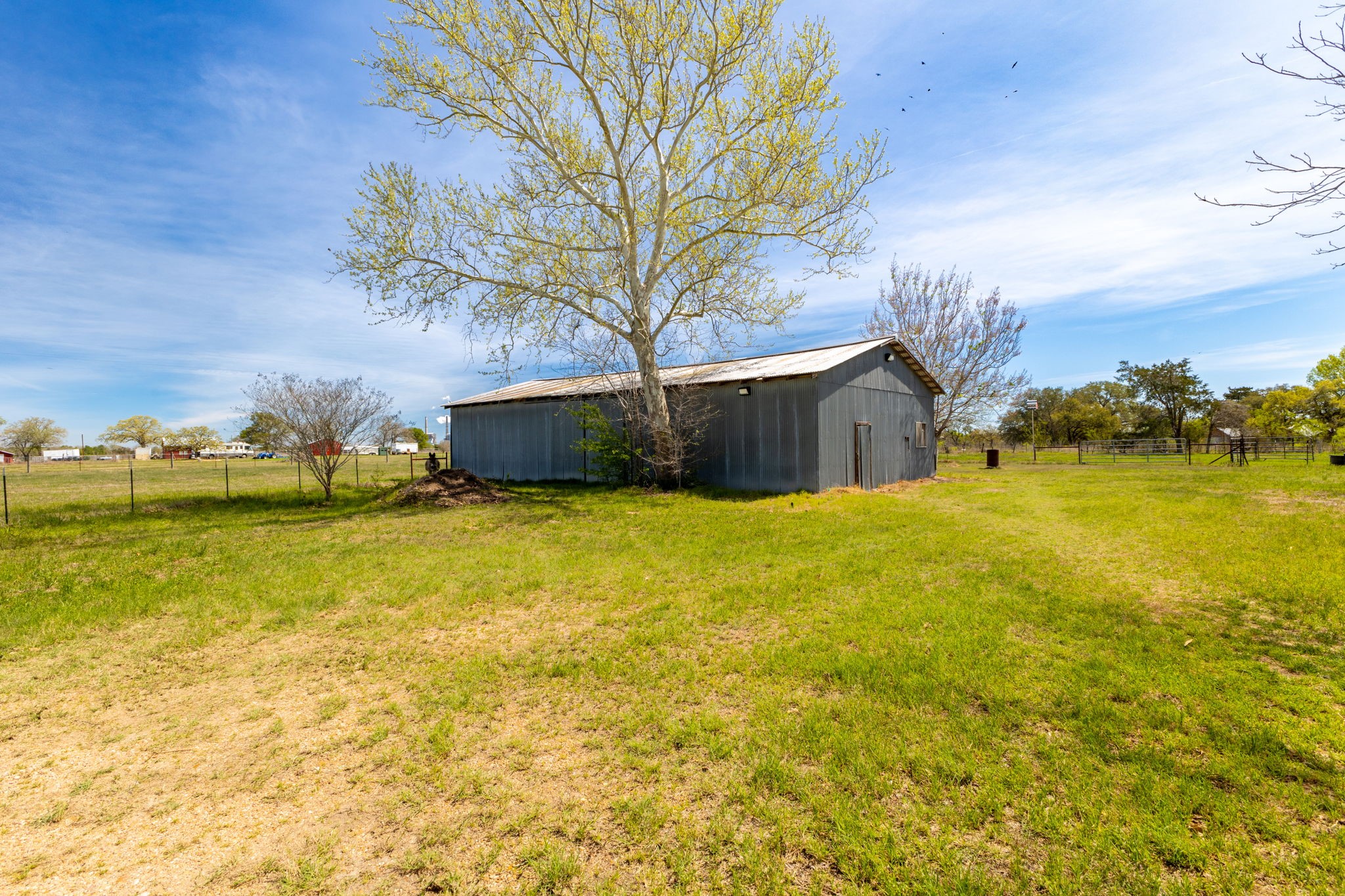 212 Halstedt Road La Grange, TX 78945 - Photo 37 of 40 a swimming pool with some trees in the background
