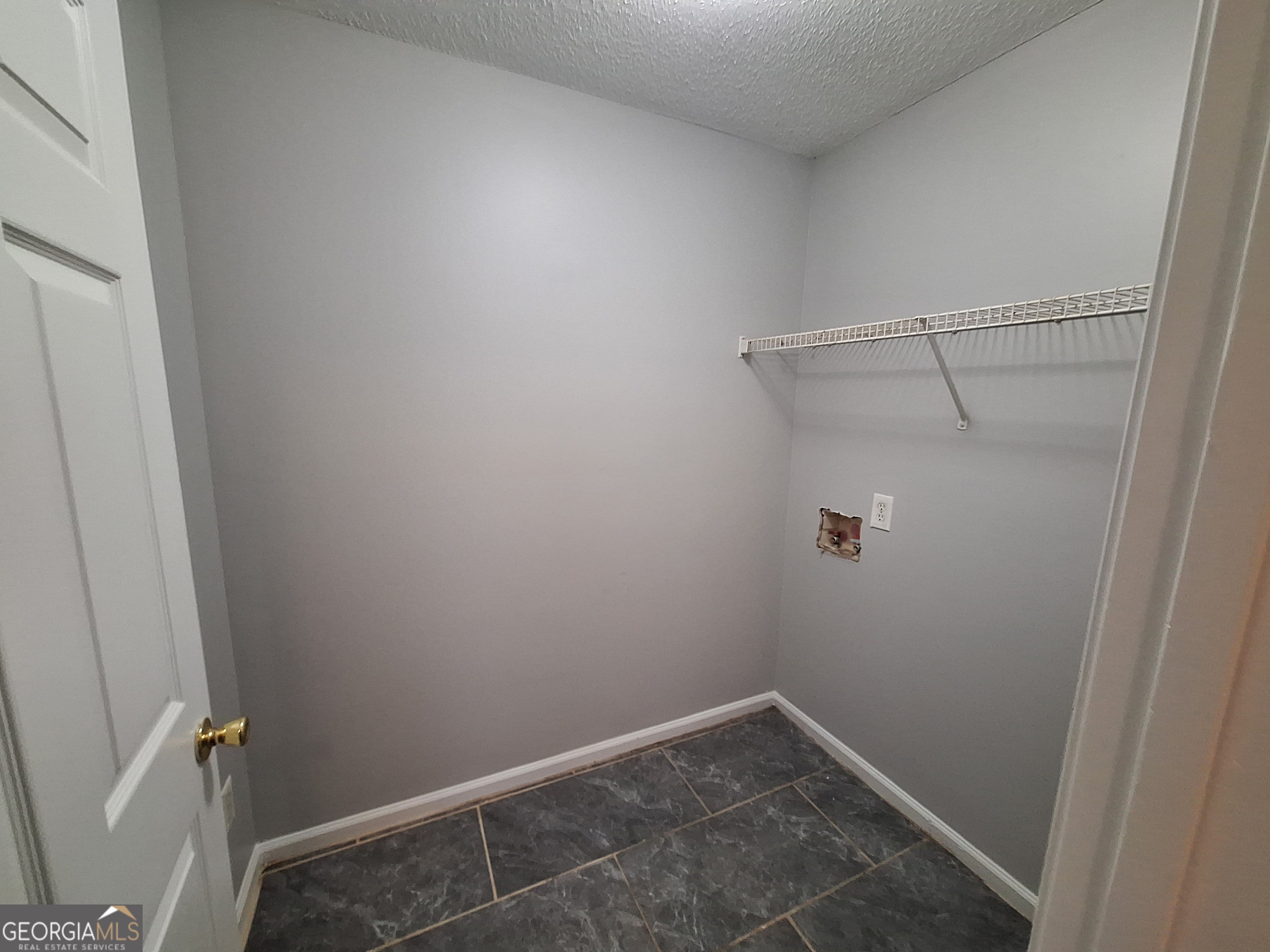 5633 Rutland Drive Southwest Powder Springs, GA 30127 - Photo 11 of 11 a view of utility room