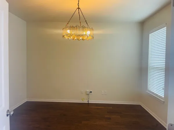 a view of a chandelier in a room