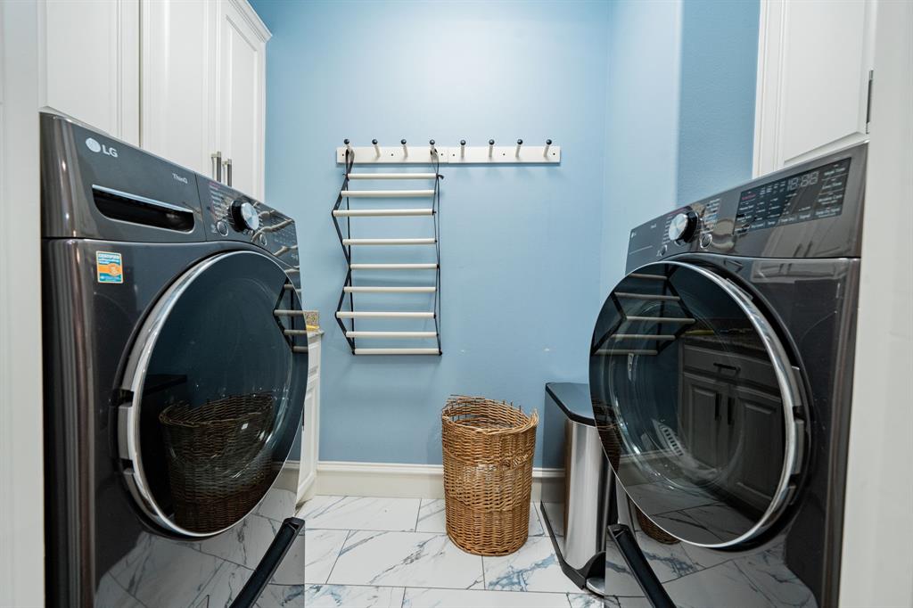 5517 Longview Street Dallas, TX 75206 - Photo 20 of 33 a utility room with dryer and washer