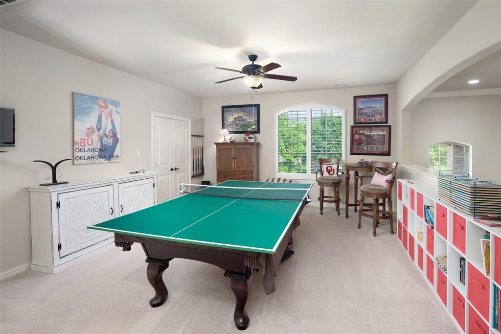 1031 Fox Bend Way Prosper, TX 75078 - Photo 23 of 40 a room with pool table and windows
