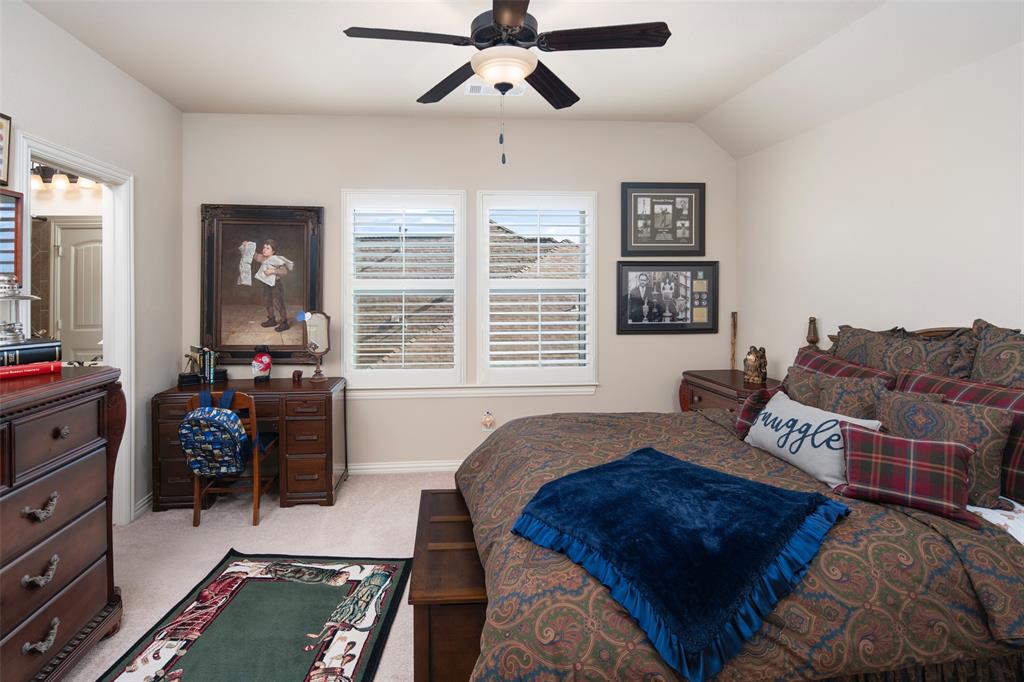 1031 Fox Bend Way Prosper, TX 75078 - Photo 26 of 40 a bedroom with furniture and a window