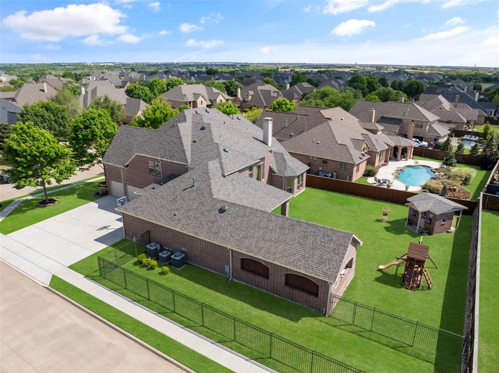 1031 Fox Bend Way Prosper, TX 75078 - Photo 34 of 40 an aerial view of a house with a garden