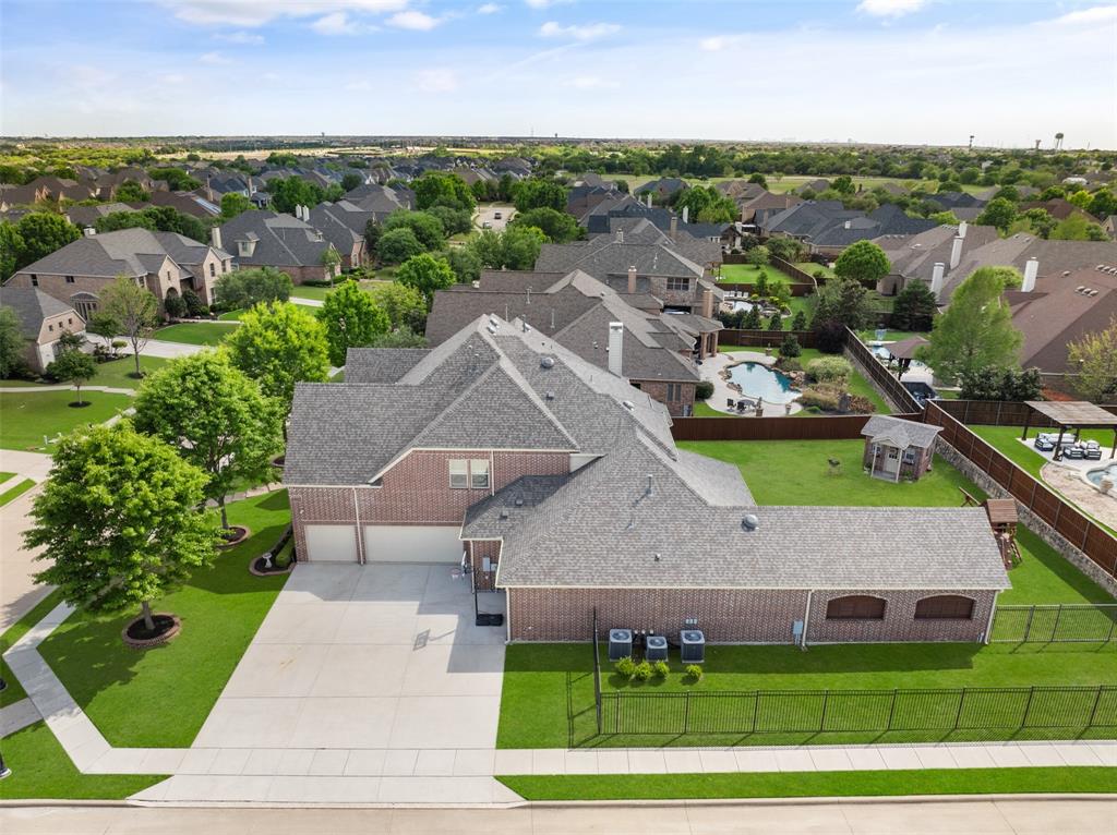 1031 Fox Bend Way Prosper, TX 75078 - Photo 35 of 40 an aerial view of a house with a garden