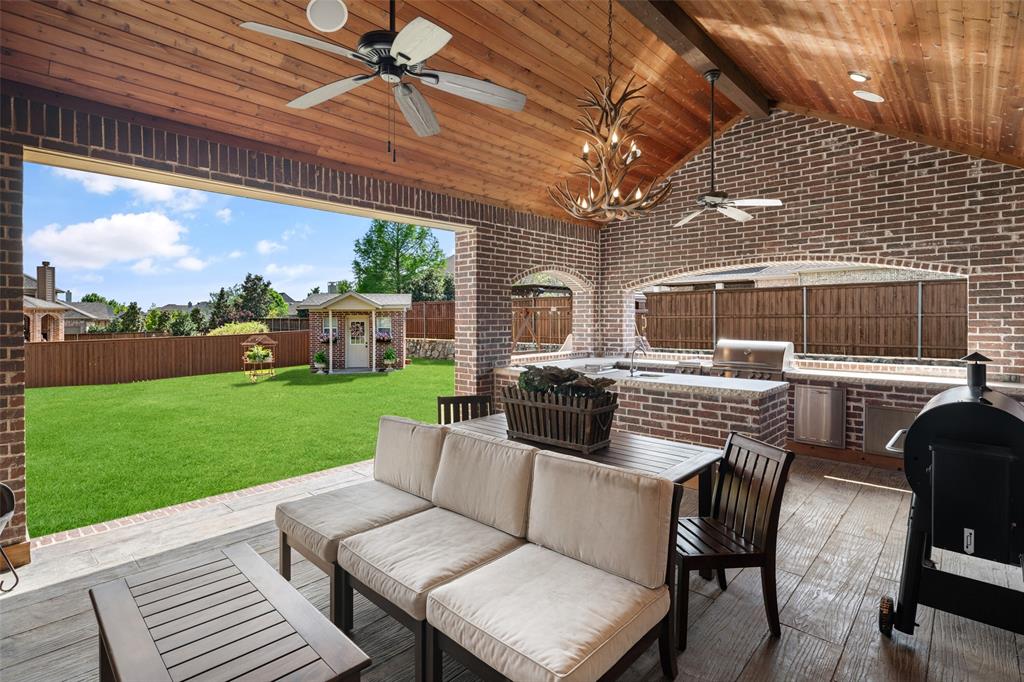 1031 Fox Bend Way Prosper, TX 75078 - Photo 7 of 40 a view of a patio with couches table and chairs