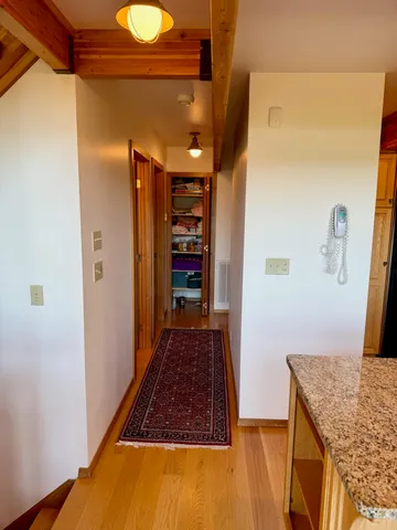 a bedroom with bed and a window