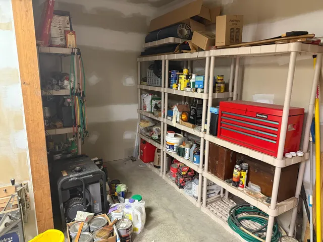 a view of a terrace with a garden and trees