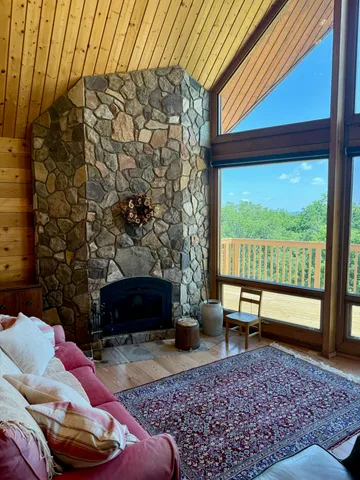 a open kitchen with stainless steel appliances granite countertop a stove and a refrigerator