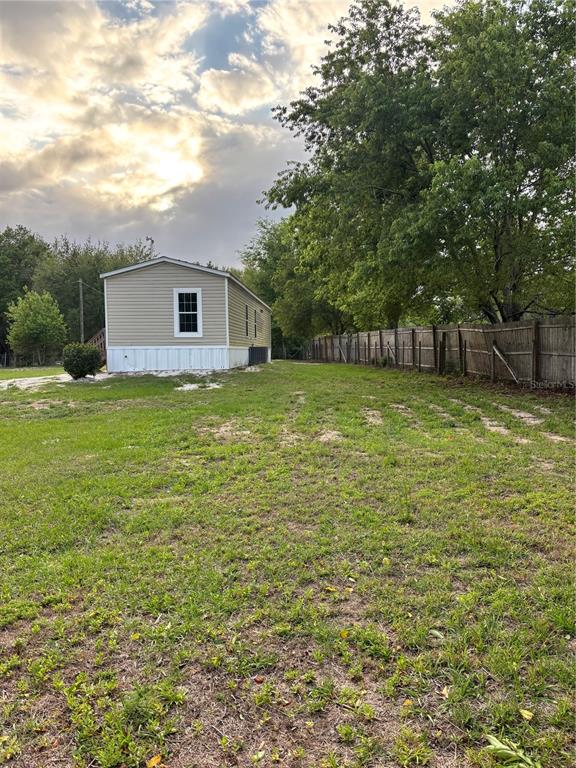 11511 Northeast 110th Road Oxford, FL 34484 - Photo 11 of 43 a view of a tree in a yard