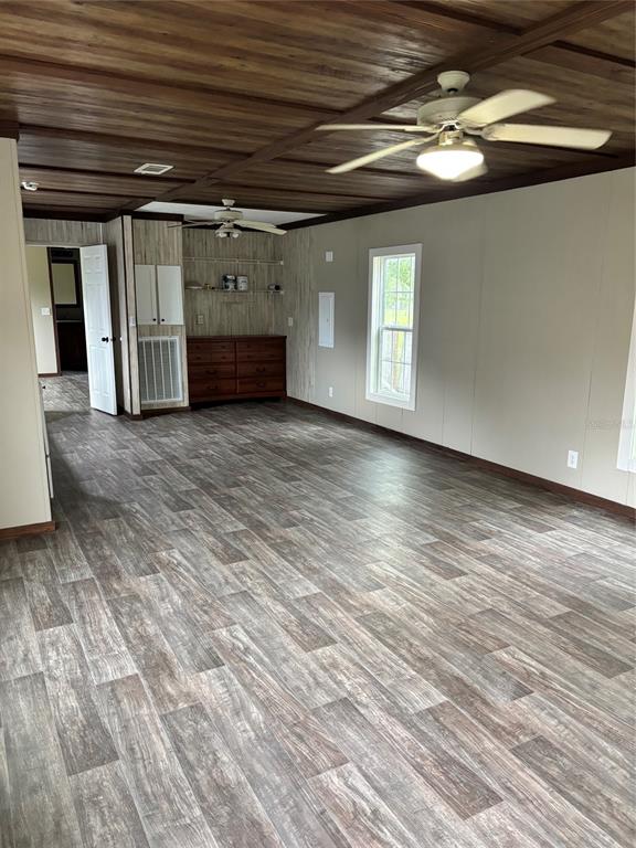 11511 Northeast 110th Road Oxford, FL 34484 - Photo 19 of 43 a view of empty room with wooden floor
