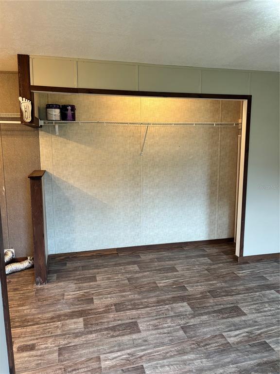 11511 Northeast 110th Road Oxford, FL 34484 - Photo 22 of 43 a view of a room with wooden floor