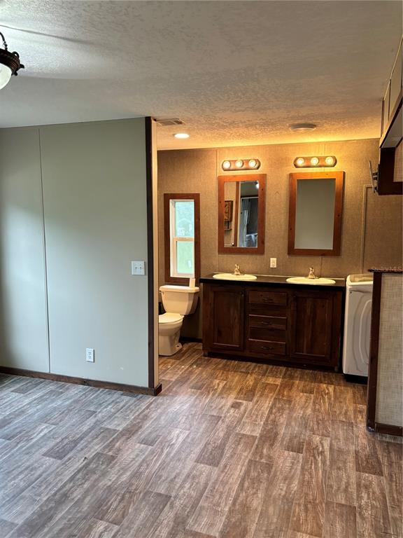 11511 Northeast 110th Road Oxford, FL 34484 - Photo 26 of 43 a bathroom with a vanity and a mirror