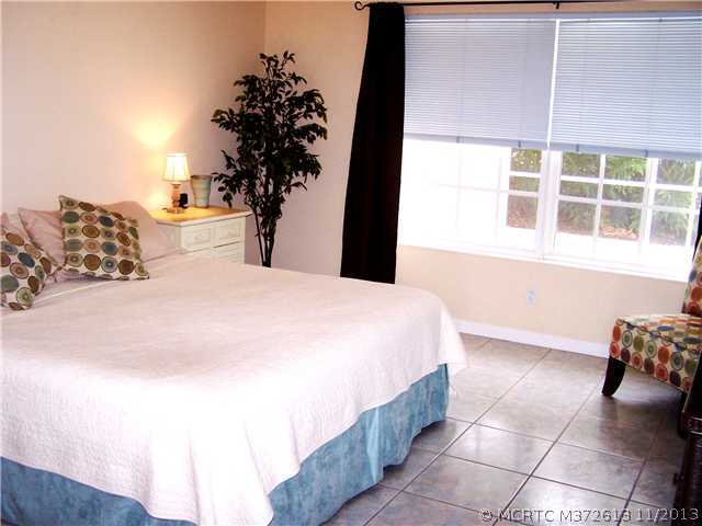 915 Southwest Tamarrow Place Stuart, FL 34997 - Photo 7 of 19 Master Bedroom.