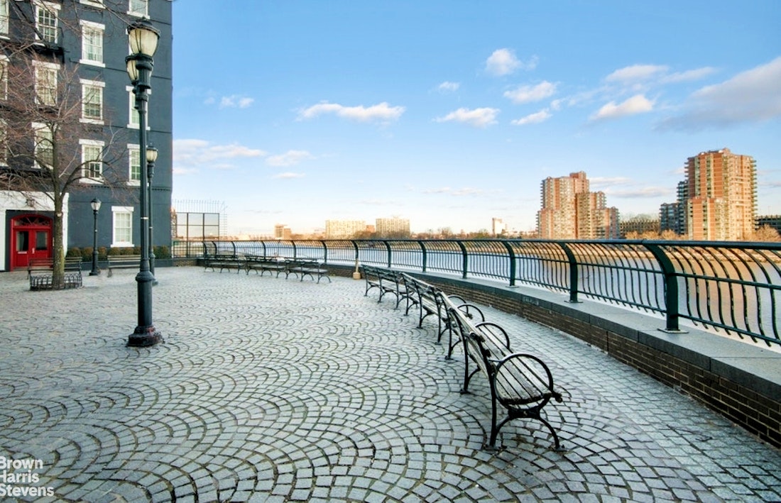 530 East 72nd Street, Unit 9B Manhattan, NY 10021 - Photo 14 of 18 a view of a terrace with wooden benches