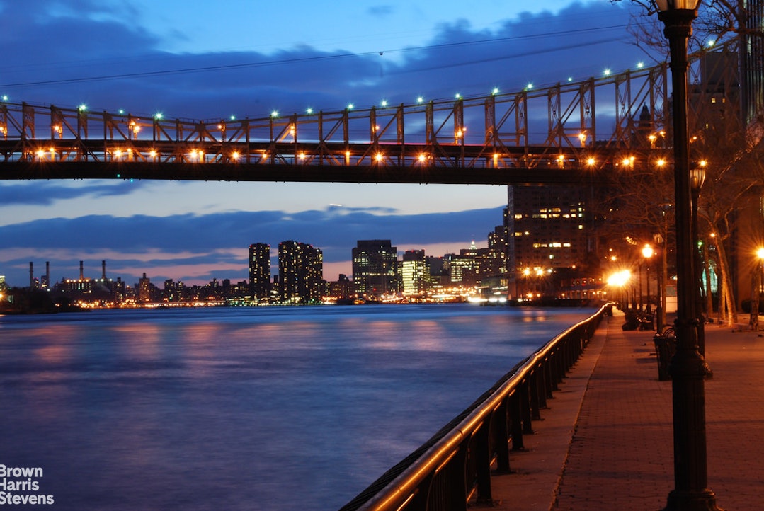 530 East 72nd Street, Unit 9B Manhattan, NY 10021 - Photo 16 of 18 a view of city and a lake
