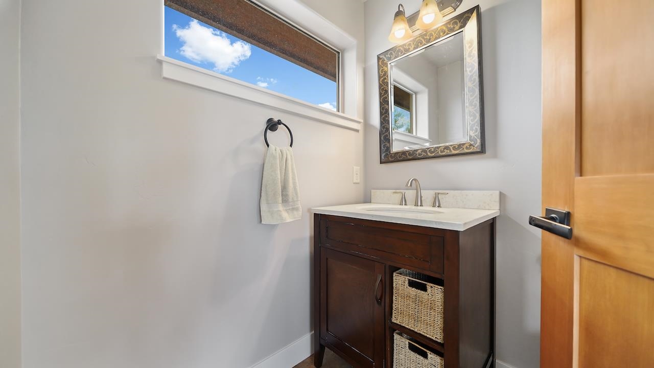 949 Kayenta Way Fruita, CO 81521 - Photo 28 of 41 a bathroom with a sink and a mirror