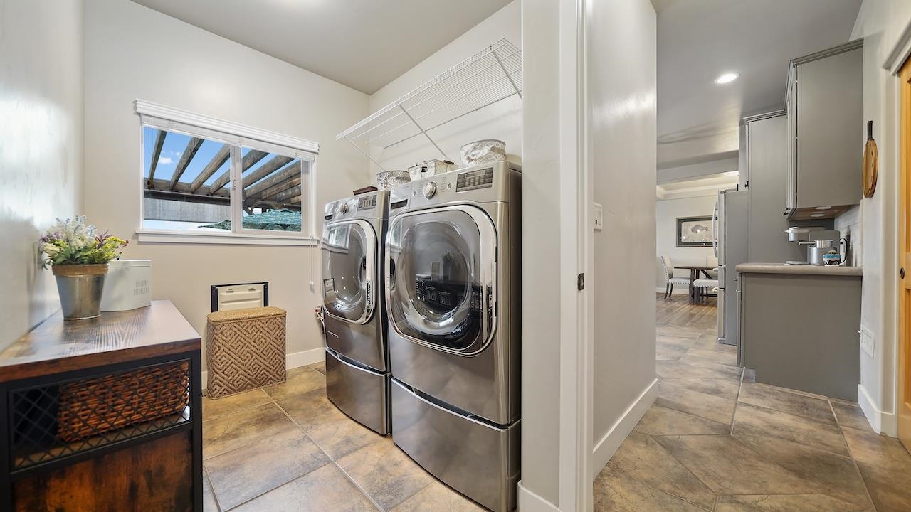 949 Kayenta Way Fruita, CO 81521 - Photo 29 of 41 a utility room with sink dryer and washer