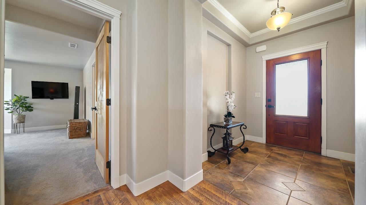 949 Kayenta Way Fruita, CO 81521 - Photo 4 of 41 a view of a hallway with livingroom and furniture