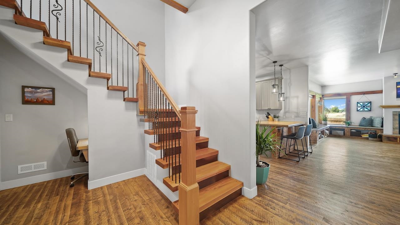 949 Kayenta Way Fruita, CO 81521 - Photo 5 of 41 a view of entryway and hall with wooden floor