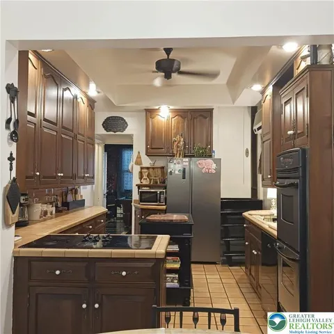 a bathroom with a toilet a sink and shower
