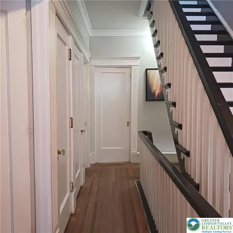 a bathroom with a tub and shower