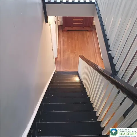 a bathroom with a sink a toilet and bathtub