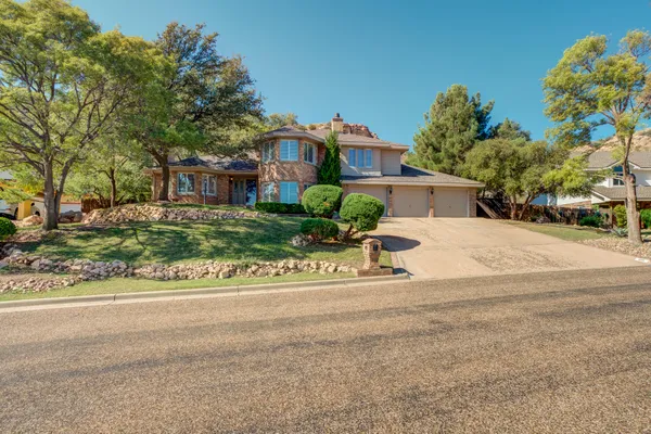 front view of a house with a small yard