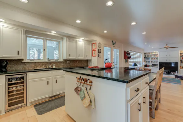 a view of a wooden fence and a bench