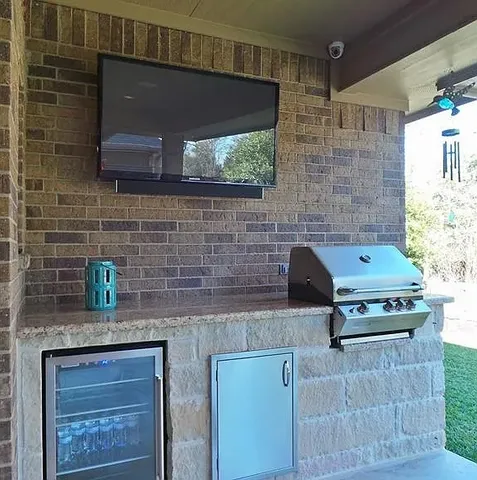 a view of a house with a backyard and a small yard