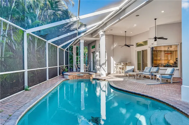 a view of a living room and kitchen