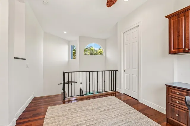 a view of entryway with wooden floor