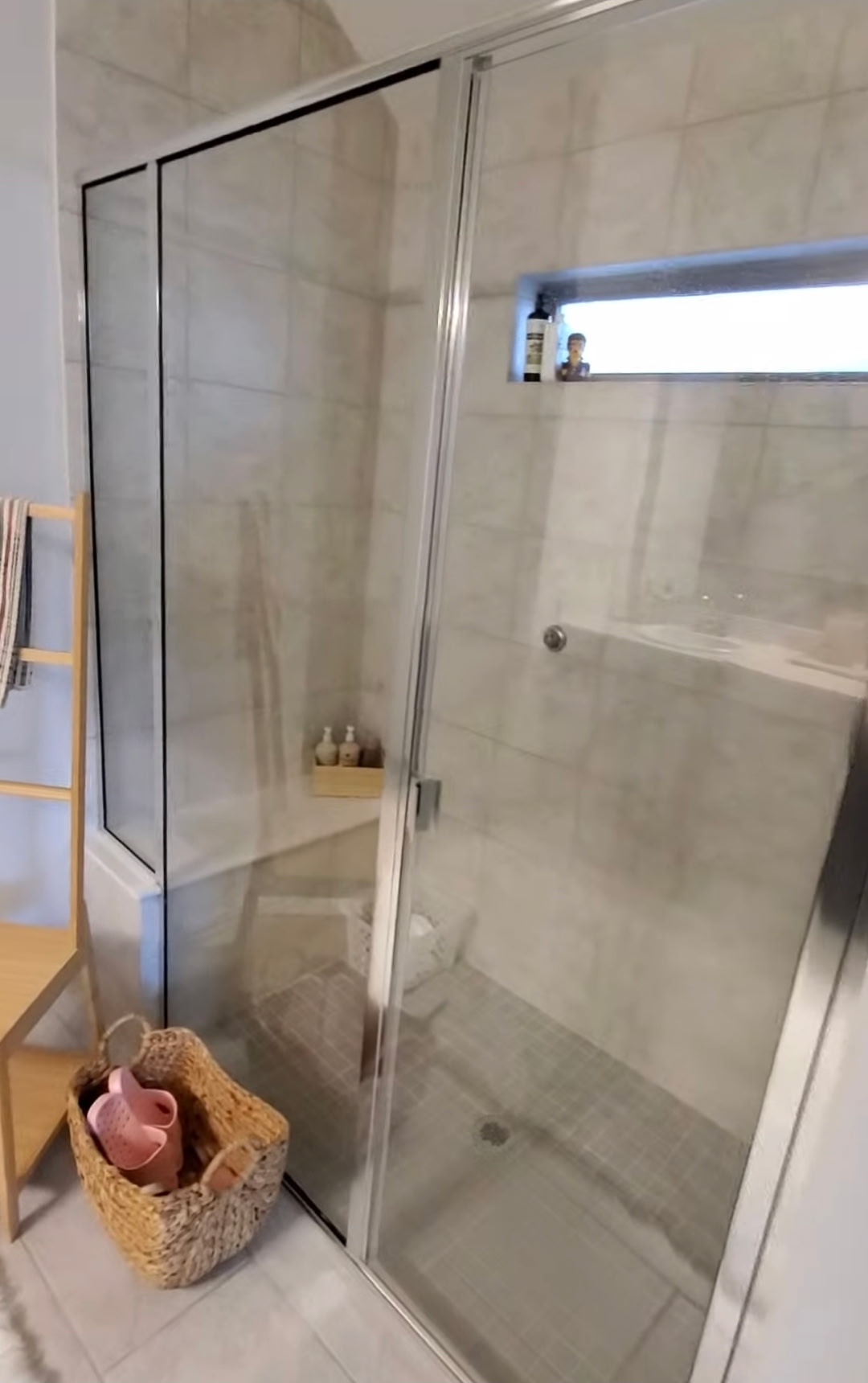 3833 Mercer Road Georgetown, TX 78628 - Photo 17 of 25 A sleek, glass-enclosed shower with tiled walls and flooring offers a refreshing retreat.