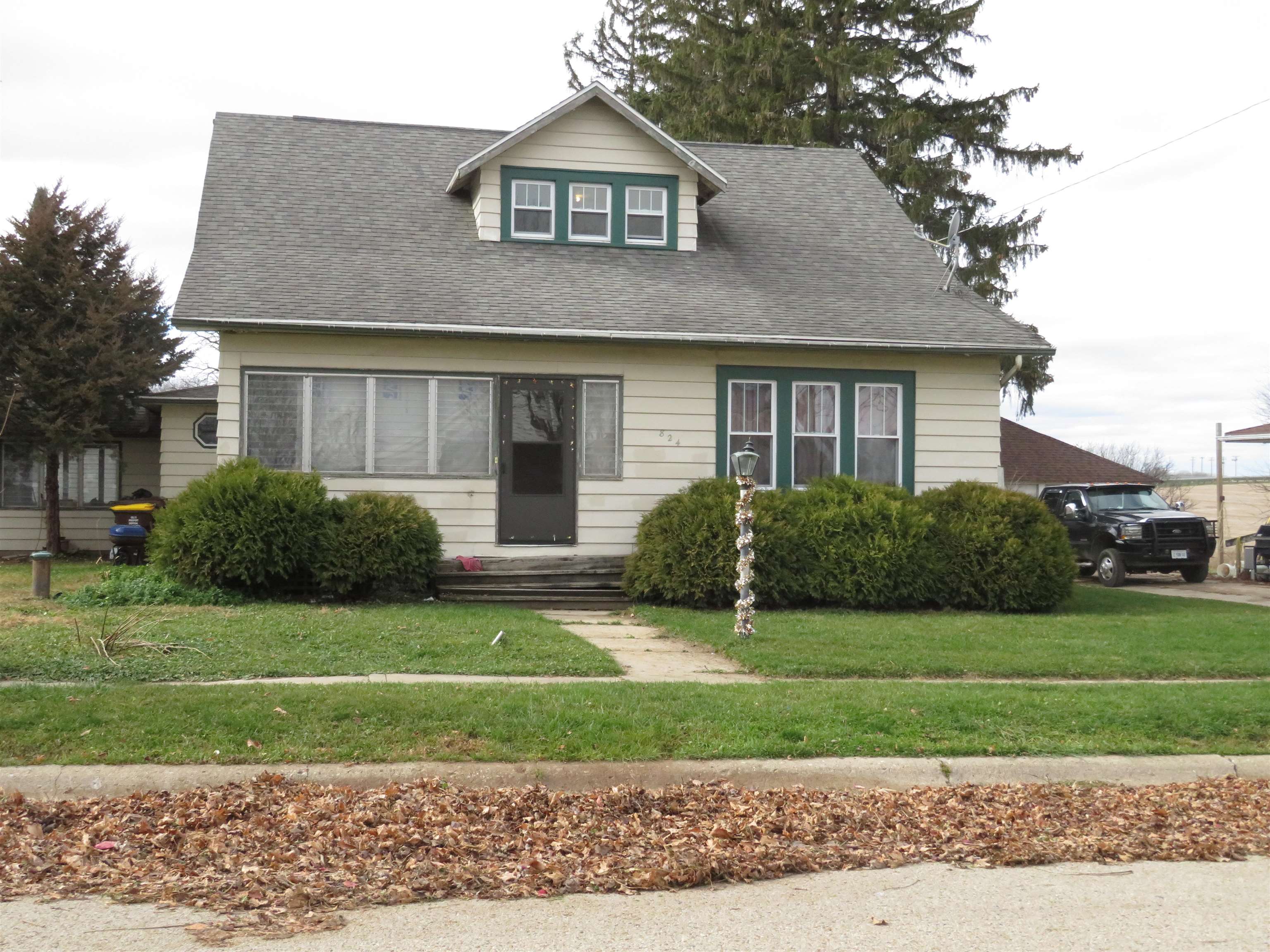 824 North Kent Road Kent, IL 61044 - Photo 1 of 1 a front view of a house with a yard