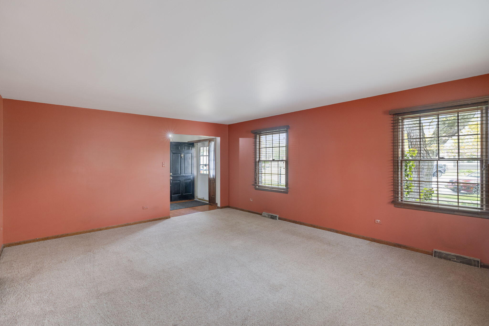 218 West 38th Court Griffith, IN 46319 - Photo 5 of 23 an empty room with windows