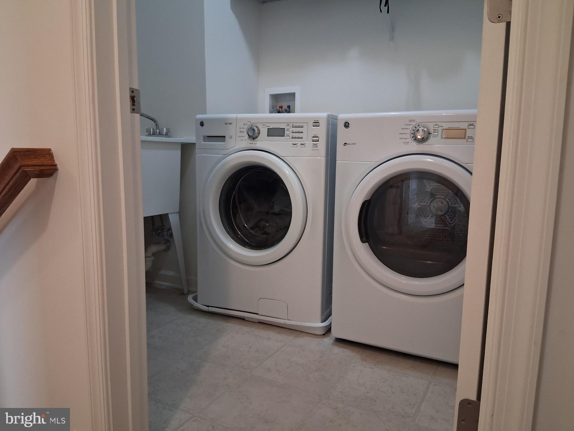 13944 Seneca Ridge Drive Hagerstown, MD 21740 - Photo 28 of 41 Modern laundry space with sleek appliances.