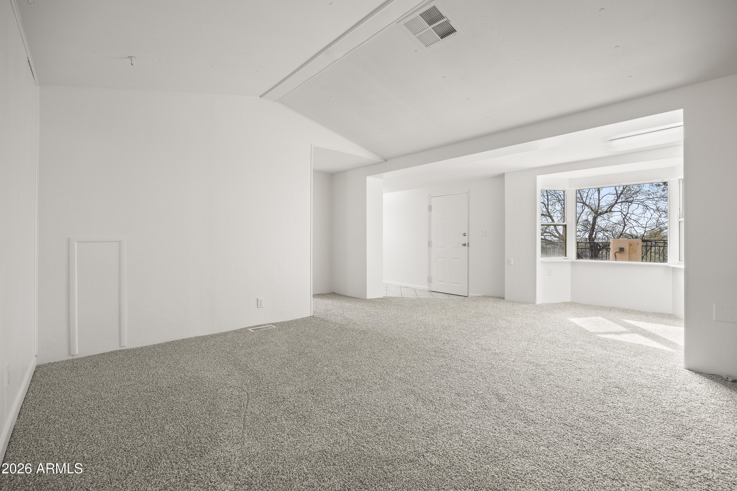 15940 North Goetz Place Tucson, AZ 85739 - Photo 19 of 37 an empty room with windows