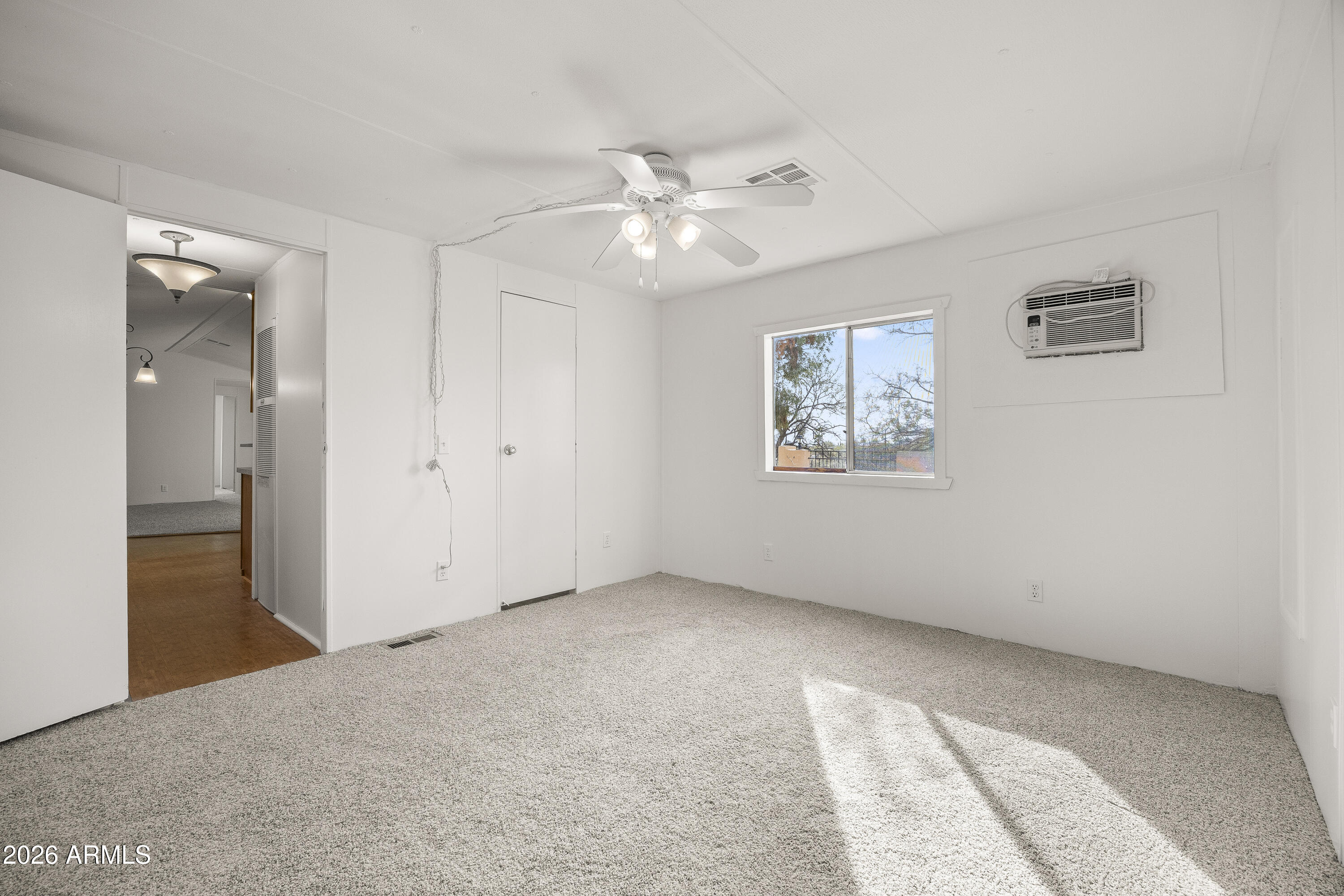 15940 North Goetz Place Tucson, AZ 85739 - Photo 22 of 37 a view of an empty room with a window
