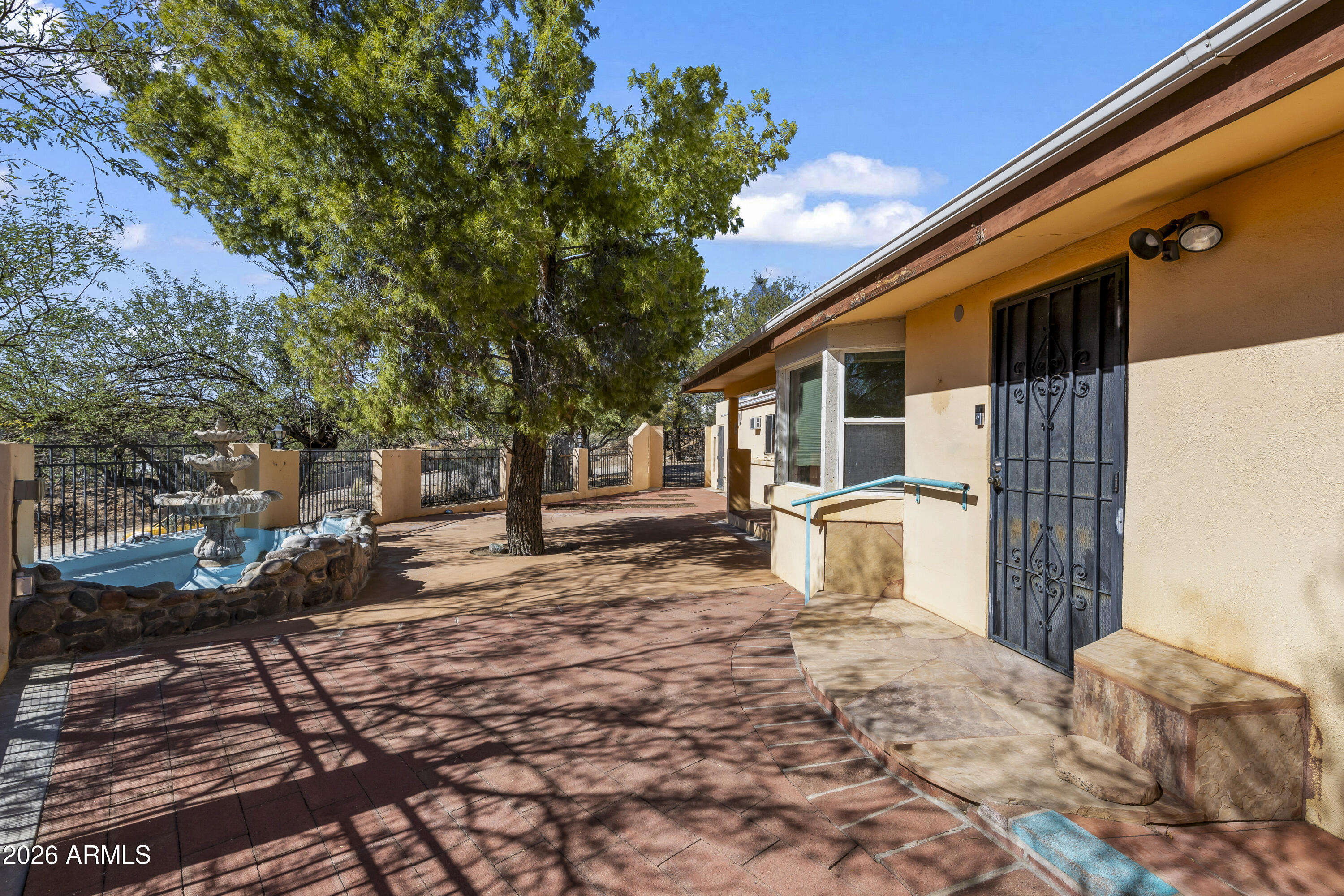 15940 North Goetz Place Tucson, AZ 85739 - Photo 32 of 37 a house view with a backyard space
