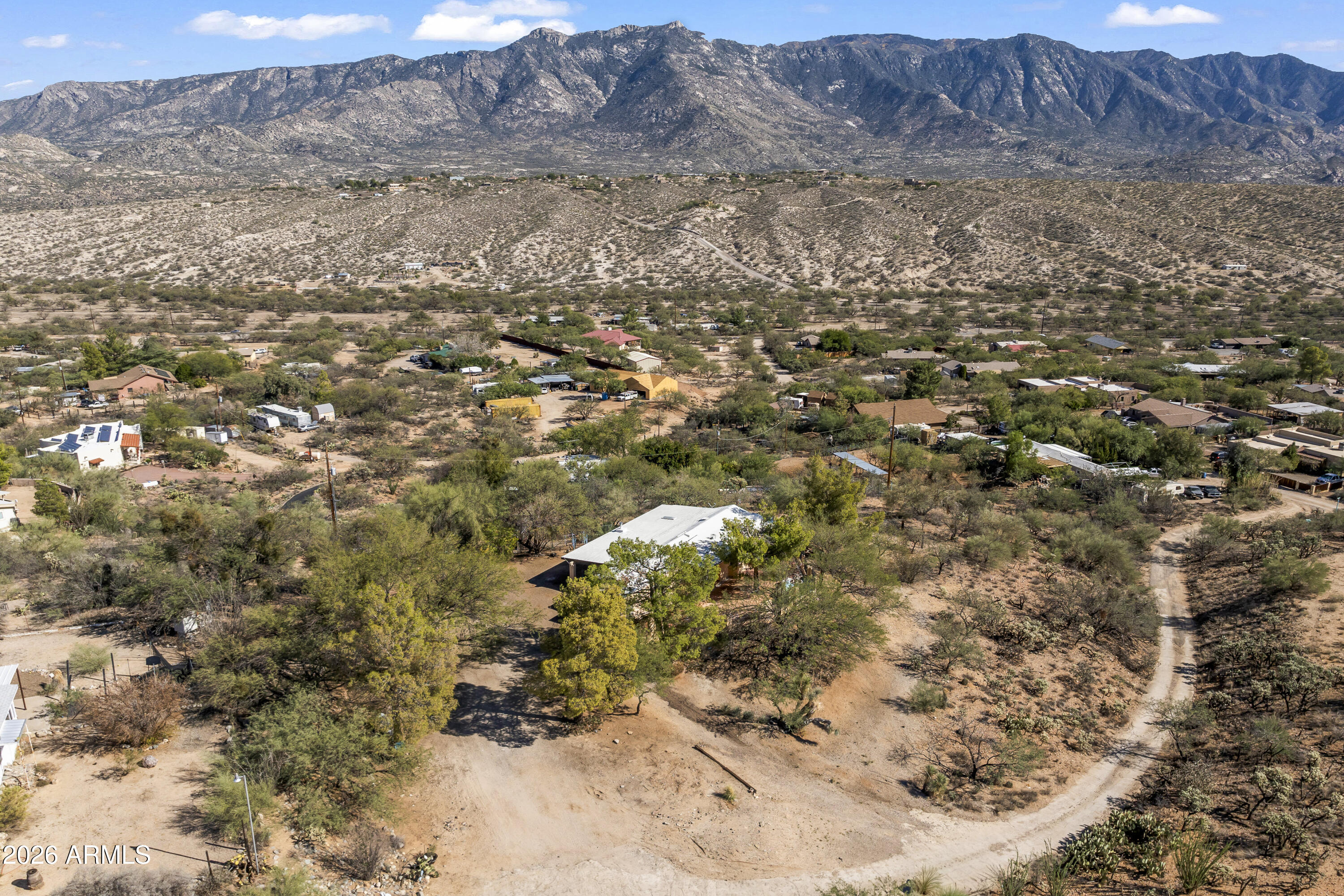 15940 North Goetz Place Tucson, AZ 85739 - Photo 34 of 37 a view of a dry yard with large trees