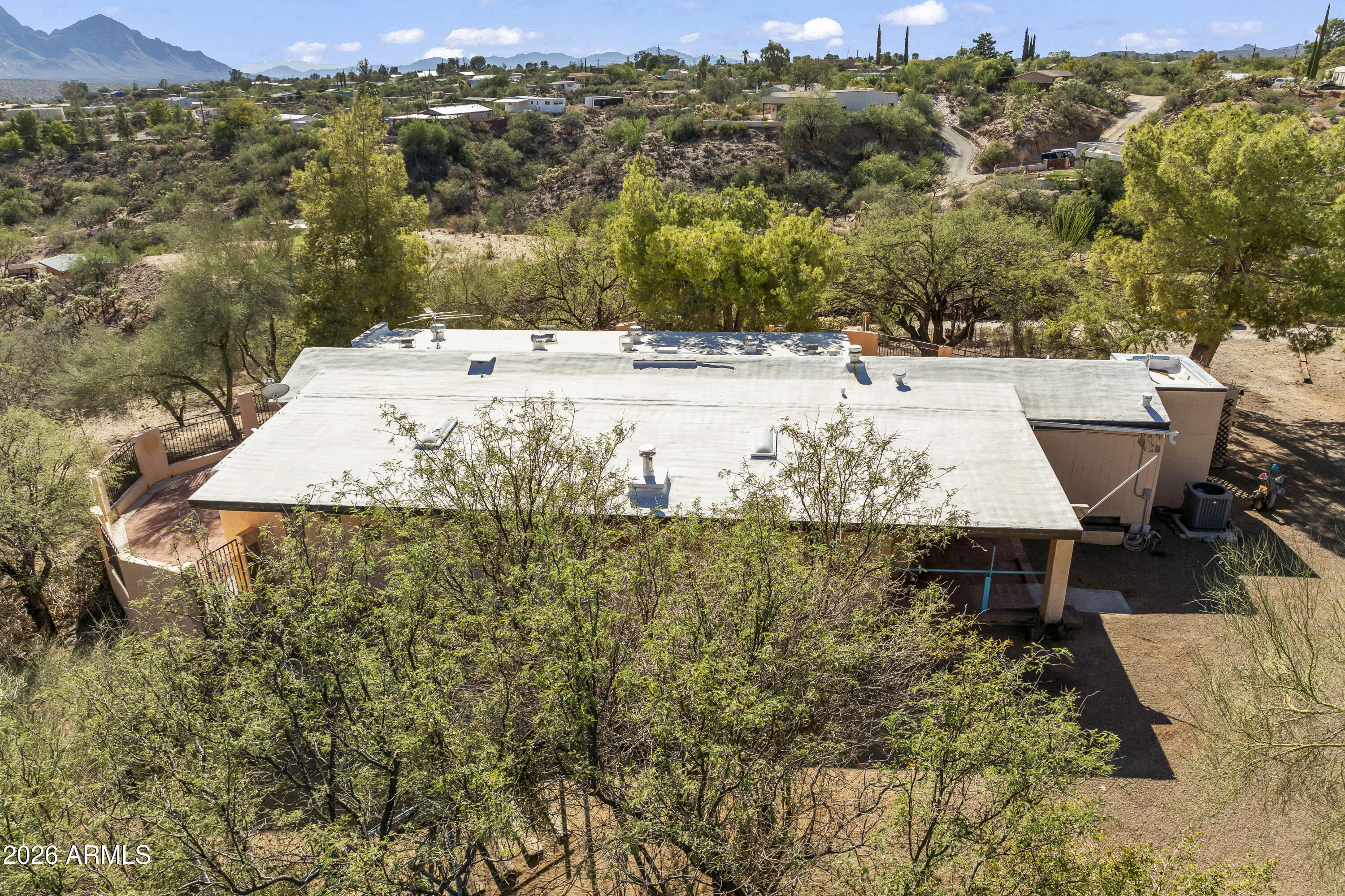 15940 North Goetz Place Tucson, AZ 85739 - Photo 36 of 37 a view of a swimming pool with a yard