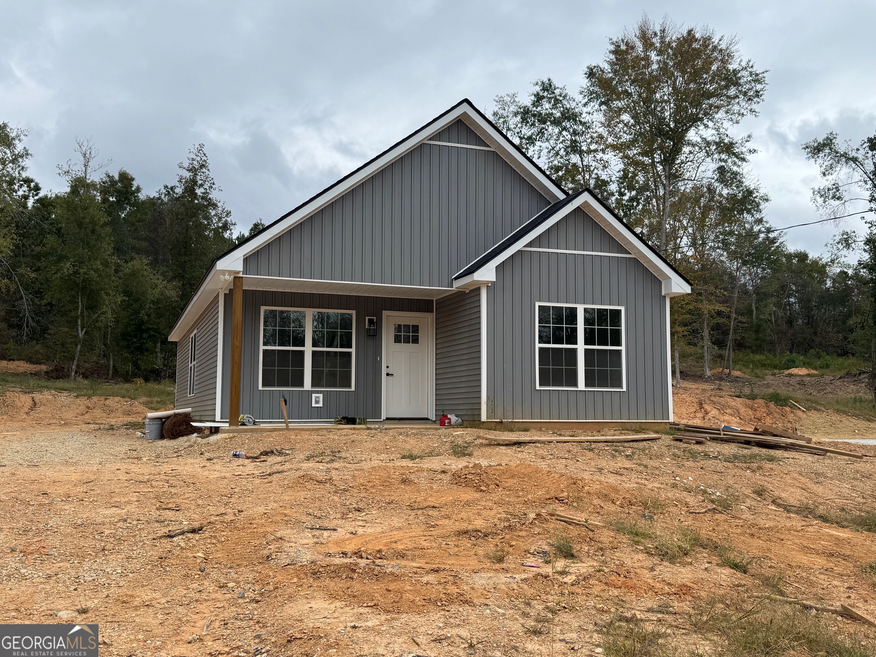 312 County Road Heflin, AL 36264 - Photo 1 of 1 a front view of a house with a yard