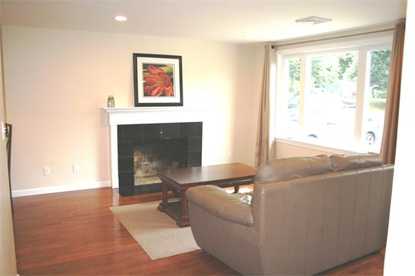 42 Indian Spring Road Ashland, MA 01721 - Photo 4 of 17 a living room with furniture and a fireplace